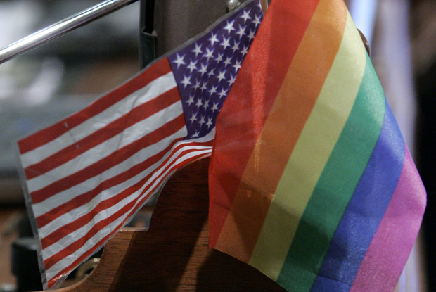 US and rainbow flags
