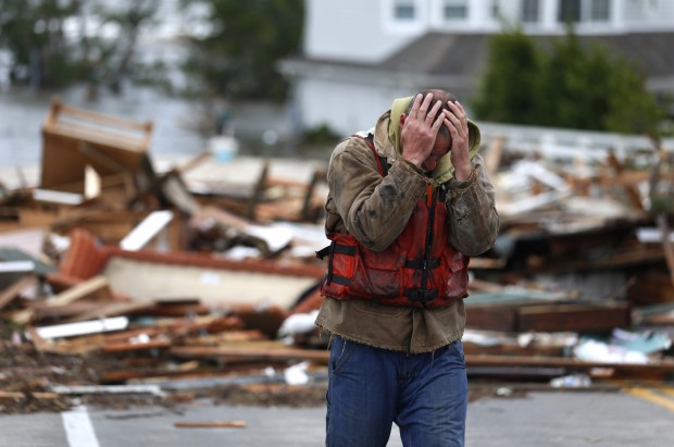 Man reacting to home washed up after Superstorm Sandy
