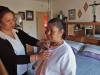 Daughter assisting mother