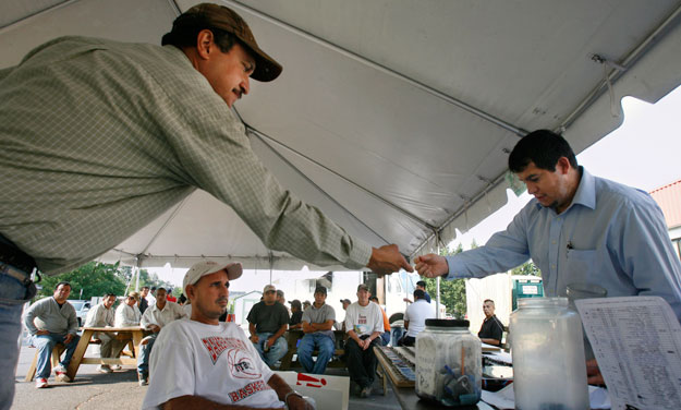 Latino workers at job site