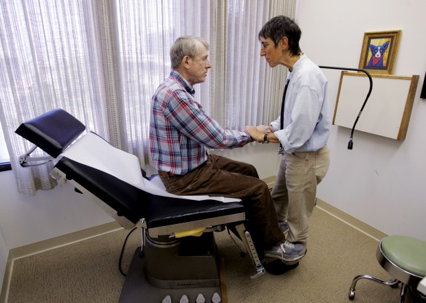 Doctor and patient in doctor's office