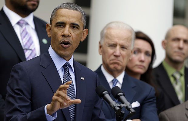 President Barack Obama gun action