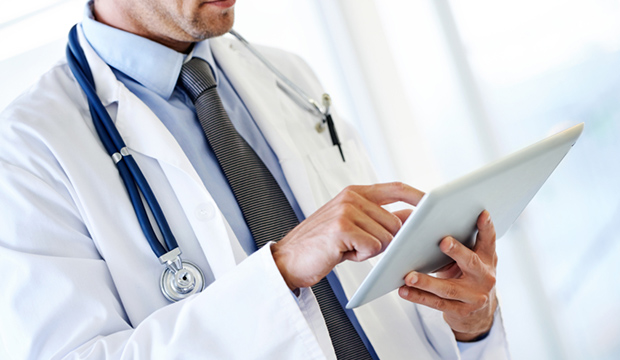 Doctor working on tablet