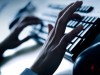 A person types on a keyboard