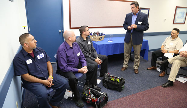 Apprentices with Ocean Spray Cranberries attend a ceremony