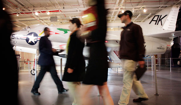 People attend a job fair.