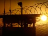 The sun rises above Camp Delta at Guantanamo Bay Naval Base