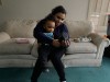 woman dresses son