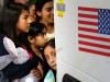 Unaccompanied children board bus.