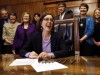 Oregon Gov. Kate Brown signs a bill