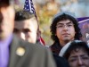 A young man attends a rally.