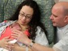 parents with newborn