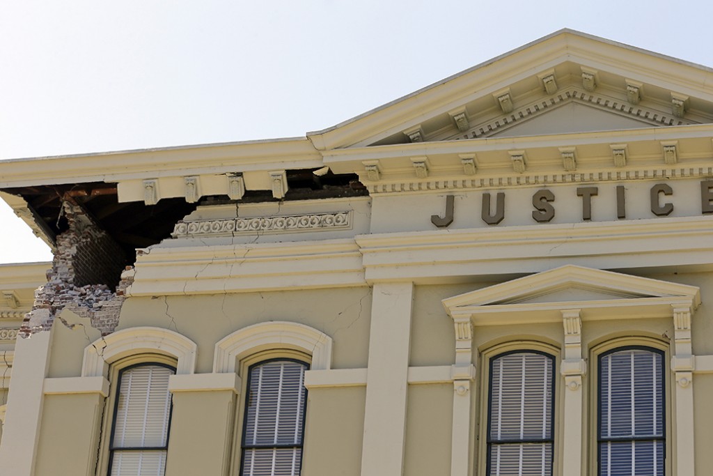 An upper corner of the Napa County Courthouse displays structural damage after an earthquake in Napa, California.