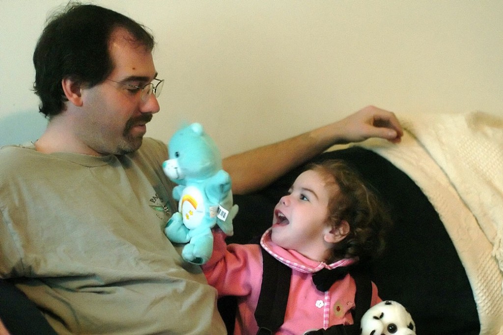 Madeleine Mirante, age 3, plays with her father, Christopher Mirante, in their living room in Plainfield, Connecticut, on April 1, 2005. 