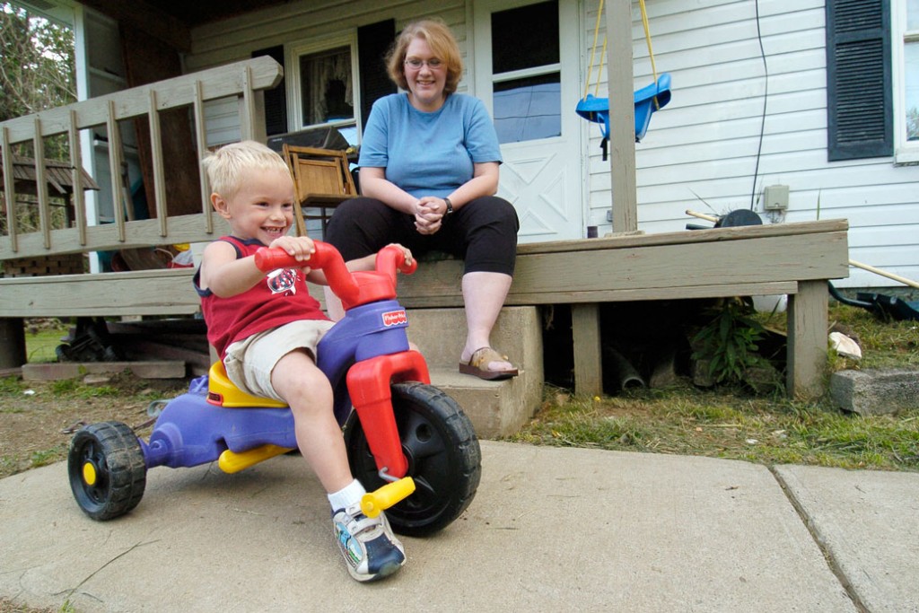 Three-year-old Cody Snyder, who has cerebral palsy, plays in his front yard in Bloomingdale, Ohio, with his mother Dawn on June 5, 2007.