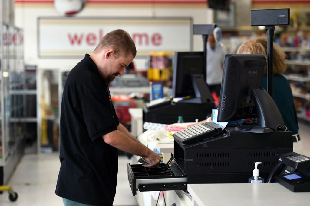 A cashier checks out a customer in Lakewood, Colorado, August 11, 2017.