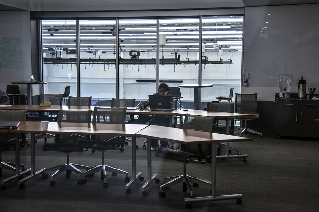 A woman completes rounds of assessments during the fourth and final day of a weeklong job training program at a college in Omaha, Nebraska, May 2018.