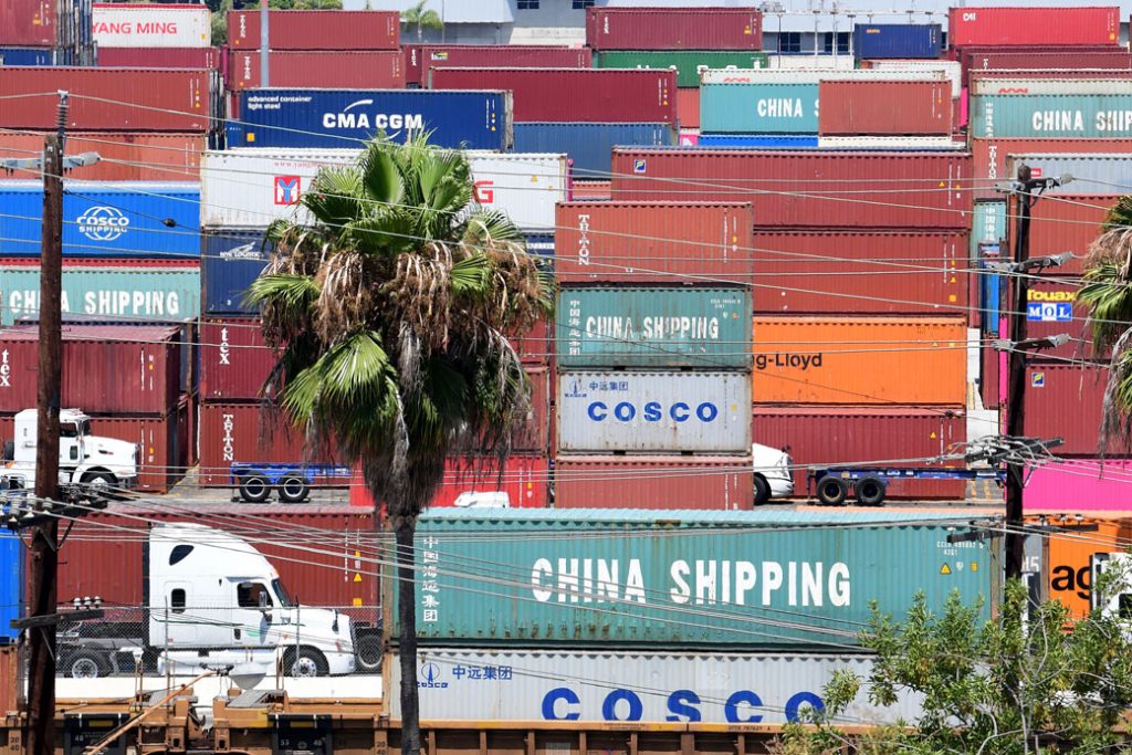 Container trucks arrive at the Port of Long Beach in Long Beach, California, August, 2019. 