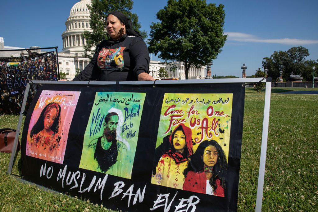 A member of the Justice for Muslims Collective protests the Trump administration's travel ban in Washington, D.C., June 2019.