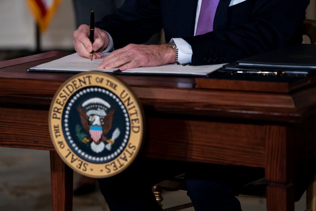 President Joe Biden signs executives orders related to his racial equity agenda on January 26, 2021, Washington, D.C.