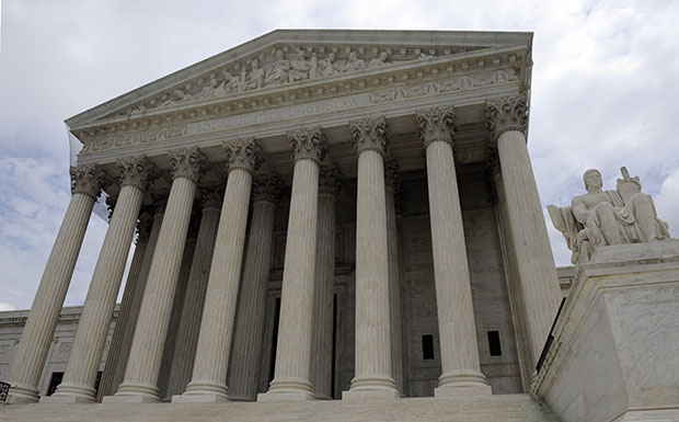 The U.S. Supreme Court is seen in Washington. Under the caps imposed by the Budget Control Act, federal discretionary spending on law enforcement and justice will fall below 0.3 percent of GDP by 2017. This category includes federal efforts aimed at crime prevention and investigation, border protection and immigration enforcement, the federal prison system, and U.S. attorneys and the federal courts, including the Supreme Court.