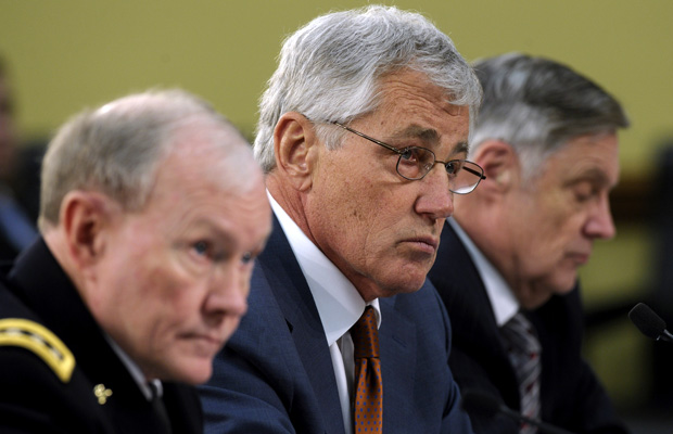 Defense Secretary Chuck Hagel, flanked by Gen. Martin Dempsey and Undersecretary of Defense Comptroller Robert Hale, testify on Capitol Hill before the House Appropriations Committee hearing on the Defense Department's fiscal 2015 budget.