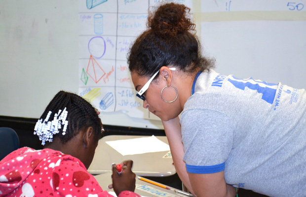 Teach for America corps member Jazmine Moore works one-on-one with a 5th grade student at Pearman Elementary School in Cleveland, Mississippi. 