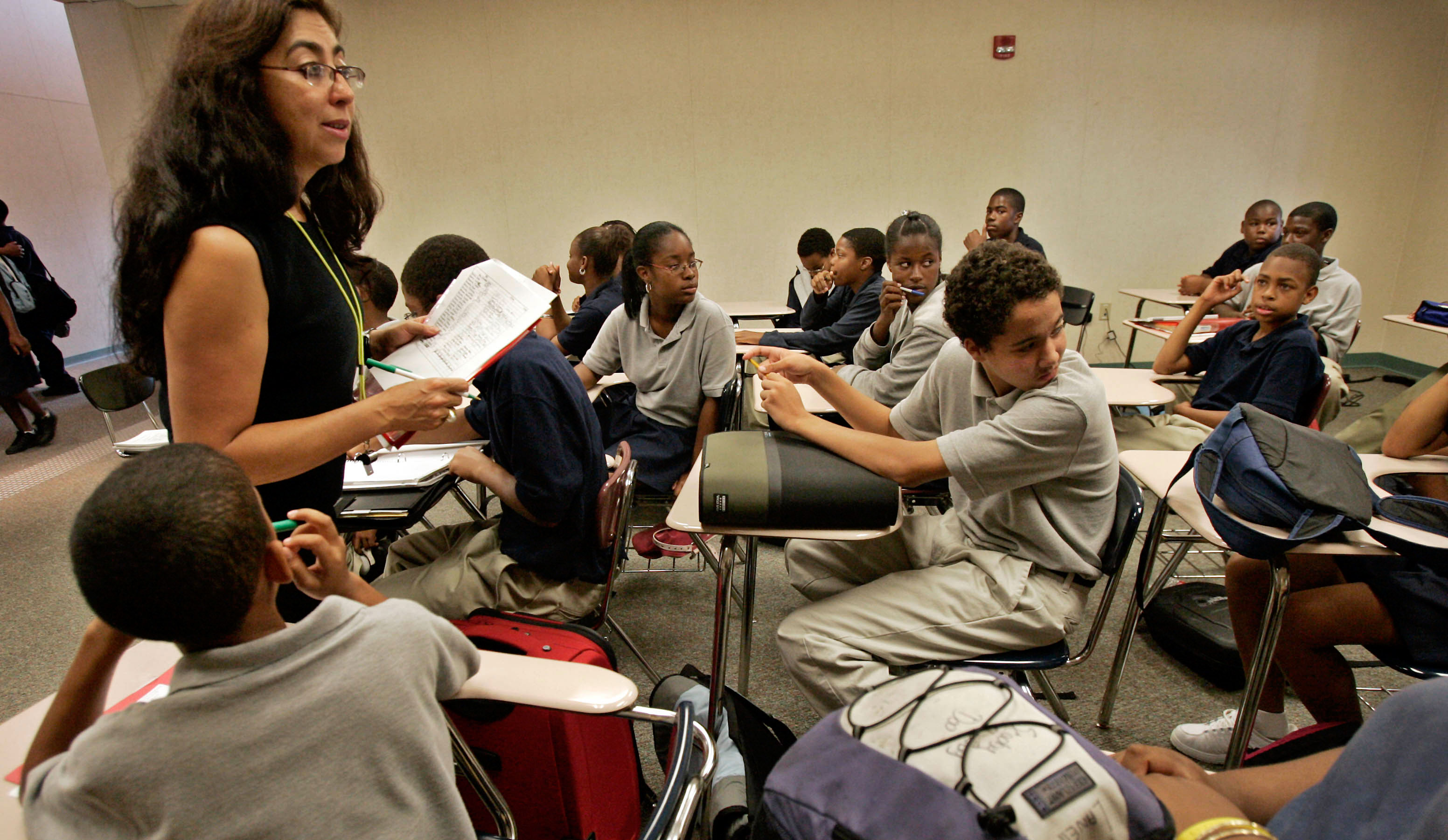 Claudia Prada, left, teaches Spanish to eighth graders at View Park Prep Charter School in South Los Angeles. 