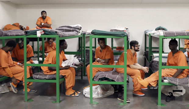 Inmates hang out on their bunks in a unit in the Harris County Jail for gay, bisexual, and transgender inmates in Houston, Texas.