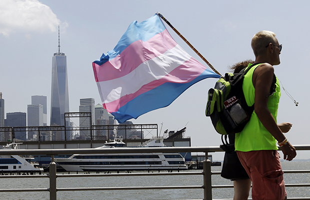 People arrive for a march and rally at the 10th annual Trans Day of Action, June 27, 2014, in New York.