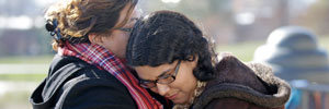 immigration press conference hug