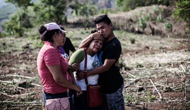 A son embraces his mother