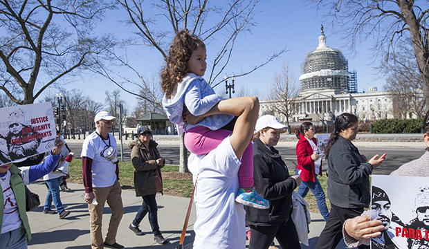 Immigration activists demonstrate at the Supreme Court in Washington in support of President Barack Obama's executive order to grant relief from deportation in order to keep immigrant families together, March 18, 2016. The U.S. Capitol is in the background.
