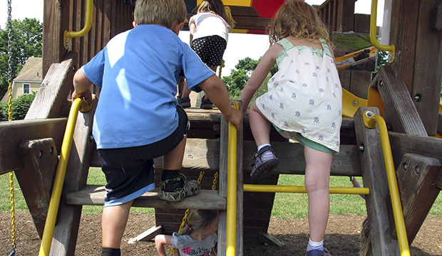 Children climb in the playground at a preschool in Hinesburg, Vermont, July 7, 2016.
