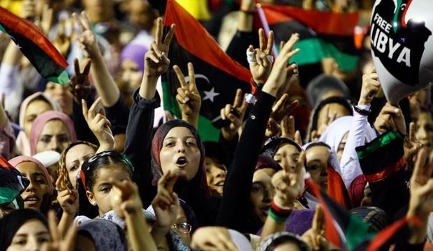 Libyan revolutionary supporters react