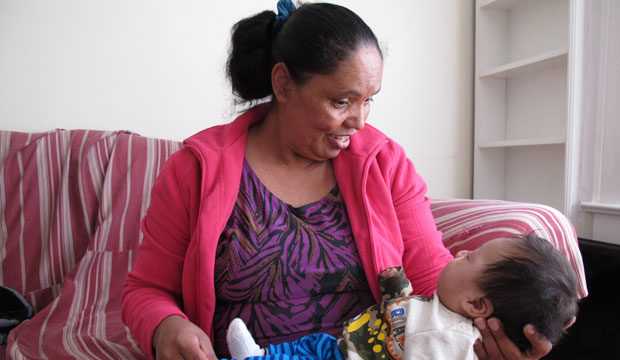 Dilsia Acosta holds her grandson, March 2016. 